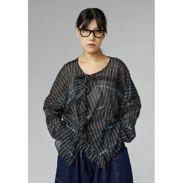 BLUSA SEMITRANSPARENTE DE...